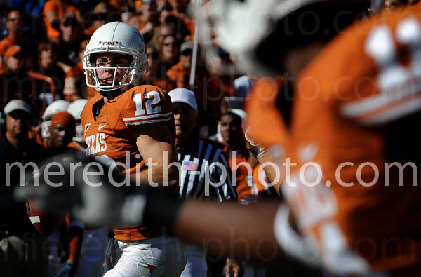Colt McCoy eyes up James Kirkendoll in the end zone during a game against Baylor last season.